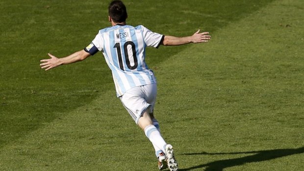 Winner: Lionel Messi celebrates his goal.