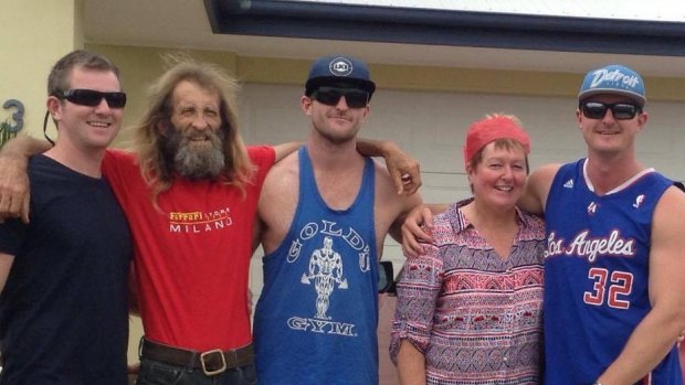 Sharon Edwards, second from right, with her husband John, second from left, and sons.