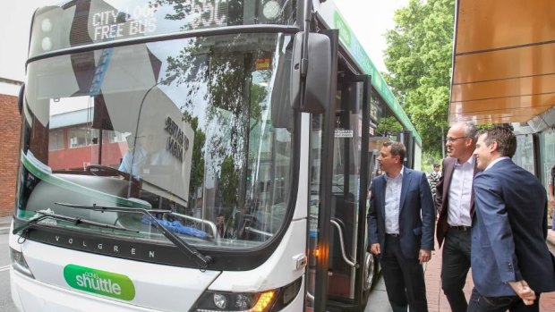 Labor leader Luke Foley (centre) with local MPs Paul Scully and Ryan Park during a visit to Wollongong to announce his commitment to the free Gong Shuttle service.
