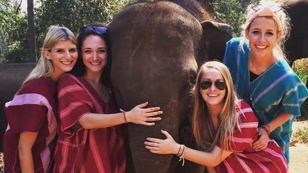 Sophia Brockman (lower right) fell "violently ill" with food poisoning after drinking a Vietnamese iced coffee.