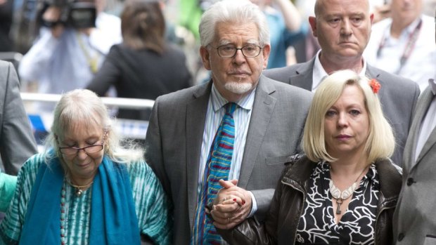 Convicted: Disgraced entertainer Rolf Harris leaves court with wife Alwen and daughter Bindi.