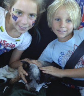 Sophie and Kai Crane-Hayes with Aussie the cattle dog when he was a  pup.