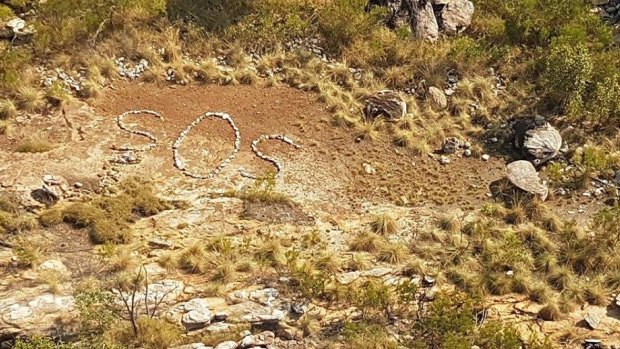 The SOS sign spotted by a pilot in the Kimberley.