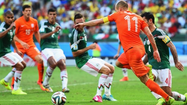 Fouled: Dutch striker Arjen Robben is tripped by Rafael Marquez of Mexico.