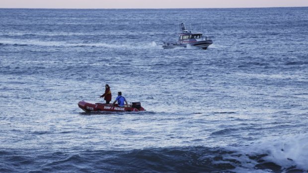 Boats search  for the boy missing from Pearl Beach.