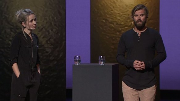 Thordis Elva and Tom Stranger speak together.