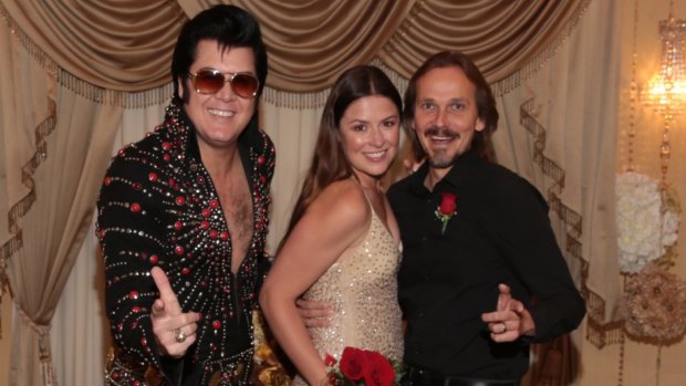 The happy couple, and Elvis.