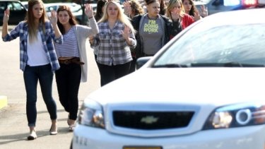 Students and staff are evacuated after a deadly shooting in Oregon.