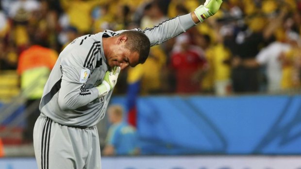 Colombia's goalkeeper Faryd Mondragon bows after his brief World Cup appearance. 
