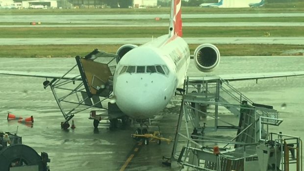 Winds wreaked havoc at Brisbane Airport as a storm hit Brisbane's north on Sunday.