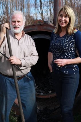 Peter Marshall with wife Kate Marshall and their biochar maker.