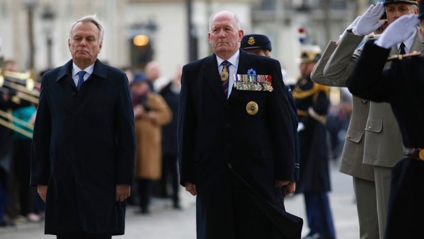 Sir Peter Cosgrove attends a ceremony at the Arc de Triomphe on Monday, with Jean-Marc Ayrault.