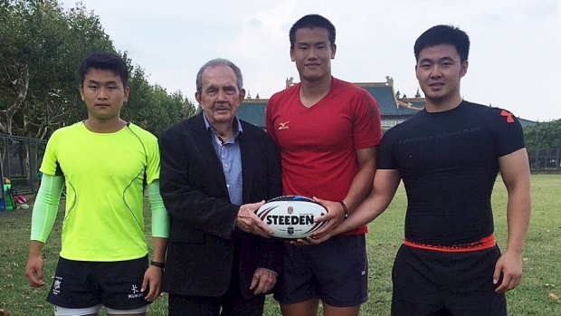 New frontier: Paul Broughton with three Chinese rugby league players. 