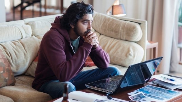Dev Patel as Saroo Brierley, obsessing searching for his birth mother using Google Earth, in <i>Lion</i>. 