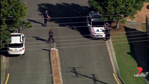 The street in Joyner, north of Brisbane, is locked down after reports a shot was fired.
