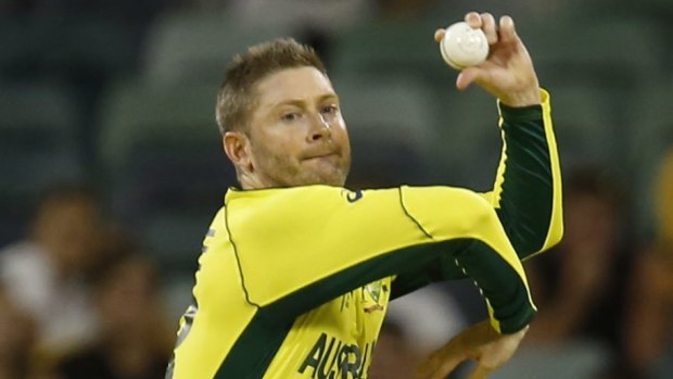 Bowling not batting: Australia's Michael Clarke in the match against Afghanistan.