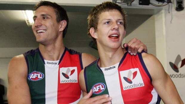 Matthew Pavlich with Nat Fyfe after his first game with the Dockers back in 2010.