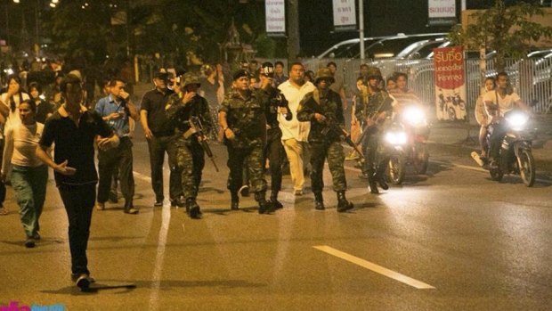 Security forces take to the streets of Phuket in a bid to restore calm after the rioting.