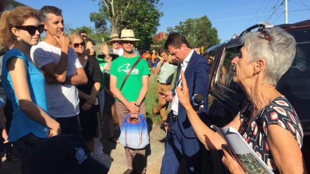 Local councillor Helen Abrahams addresses residents protesting the demolition of heritage houses in Highgate Hill.