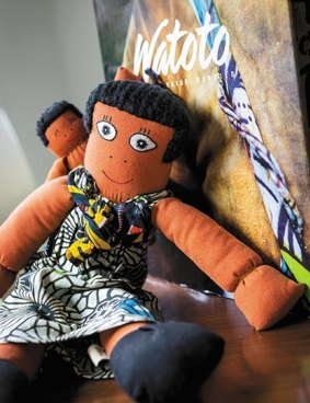 Book and doll: Paladino is the Australian ambassador for the Ugandan charity Watoto. She visited Uganda in 2014 and hopes to return in the near future.