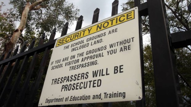 Signs at entrances to NSW schools alert visitors to their "inclosed land" status, which gives school bosses the authority to ban visitors - including parents.