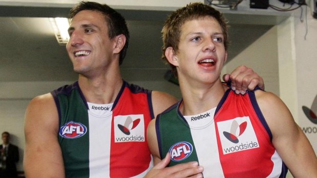 Matthew Pavlich with Nat Fyfe after his first game with the Dockers back in 2010.