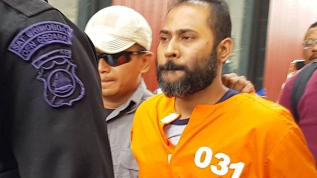 Bali jail escapee Sayed Mohammed Said returning to Bali from East Timor under heavy guard.