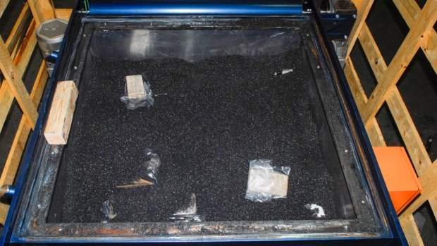 The drugs hidden inside a piece of mining equipment and covered with charcoal. 