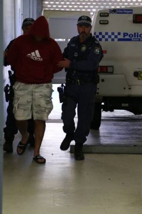 A man is arrested following nine drug raids on the NSW South Coast on Tuesday.