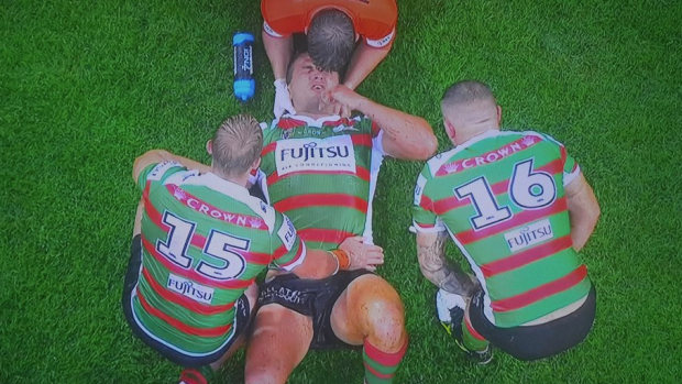 Sam Burgess is injured playing the Dragons.