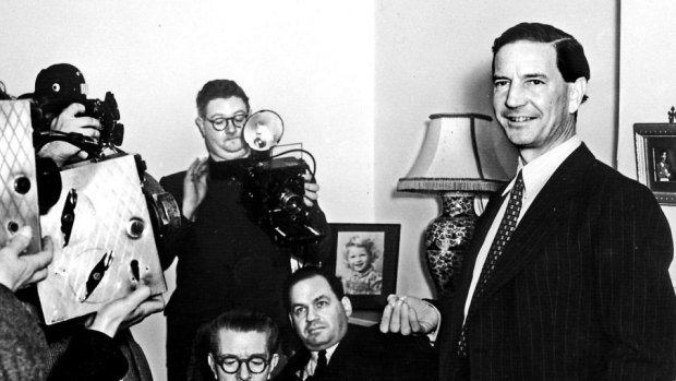 Master spy: Kim Philby at his mother's home with the British press.