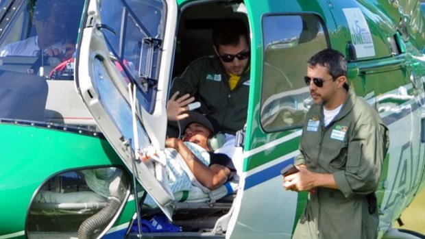 Neymar leaves Brazil's training base in a helicopter.