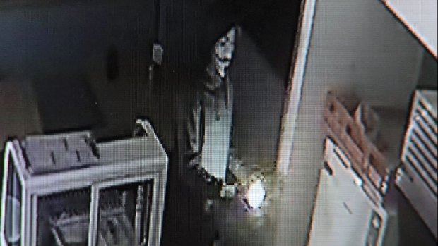 Police are appealing for information about two men who set a Maroubra cafe alight.