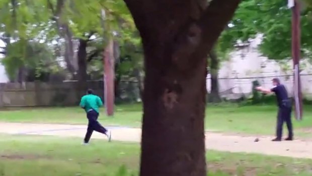 Michael Slager (right) is seen allegedly shooting 50-year-old Walter Scott on April 4.