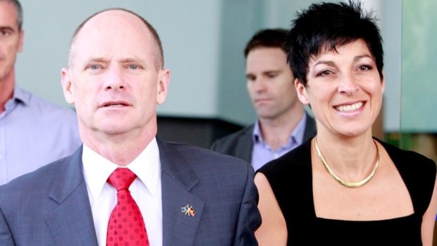 Premier Campbell Newman with wife Lisa attending the funeral of eight children in Cairns a fortnight ago.