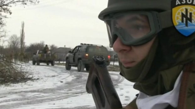 Ahead of a peace summit, Ukrainian government forces launch a counter-offensive near Mariupol in February.
