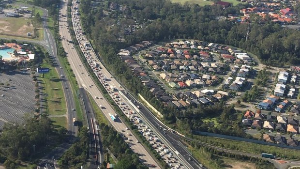 ​Police have urged drivers to avoid Queensland's busiest motorway during the games.