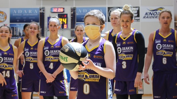 Indyanna Harper, 9, has signed with WNBL club Melbourne Boomers for one game as part of a fundraiser for bone marrow transplant research. 