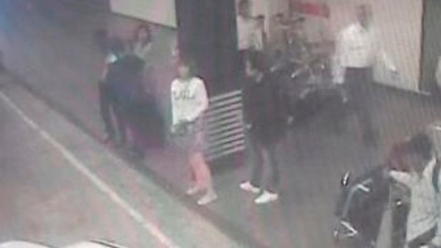 CCTV from Kuala Lumpur airport shows one of the women, centre in white, arrested in connection with Kim Jong-nam's death.