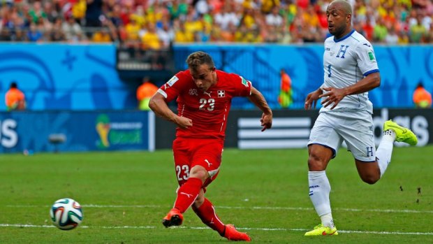 Xherdan Shaqiri fires home his second goal.