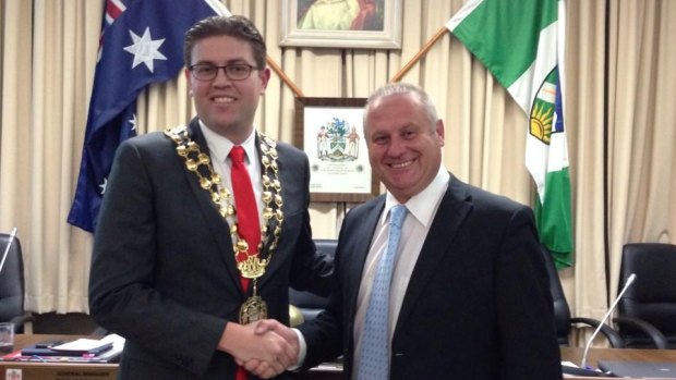 Jerome Laxale, left, has opted not to wear the mayoral robe to citizenship ceremonies