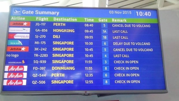 The departures board at Denpasar shows cancellations on Tuesday morning.