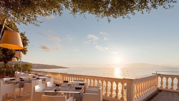 The islands of Ischia and Procida are visible from the terrace.
