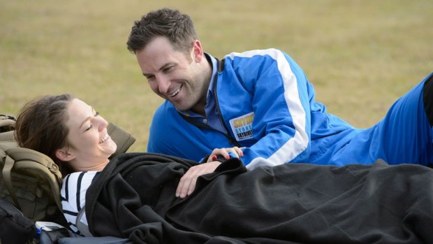 Sasha comforts Sam who was feeling faint after their skydiving date.