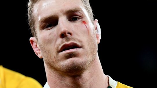 David Pocock of Australia (C) looks dejected after the final whistle during the Old Mutual Wealth Series match between England and Australia at Twickenham.