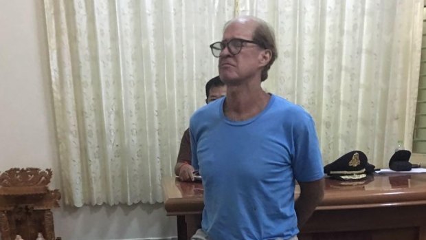 Australian filmmaker James Ricketson in custody in Phnom Penh.