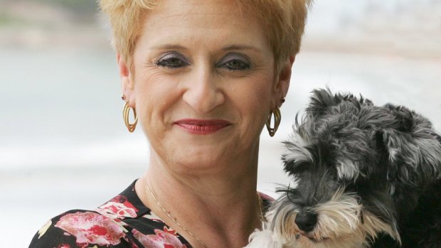 A vet bill was submitted as evidence: Marie Ficarra and her miniature schnauzer Liesel.