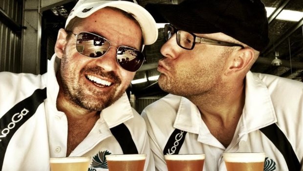 Scott Sullivan (L) and Ian Davis (R) sharing a beer during their 2013 trip.
