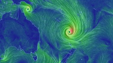 Cyclone Pam as it headed south after slamming Vanuatu, while Cyclone Nathan lingers of the Queensland coast