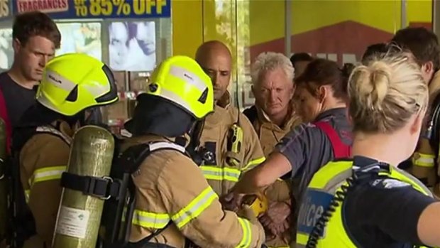 MFB crews evacuate an Abbotsford shopping centre on Saturday.